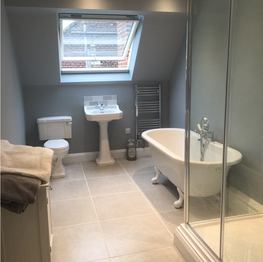 Roll-top bath in a loft bathroom